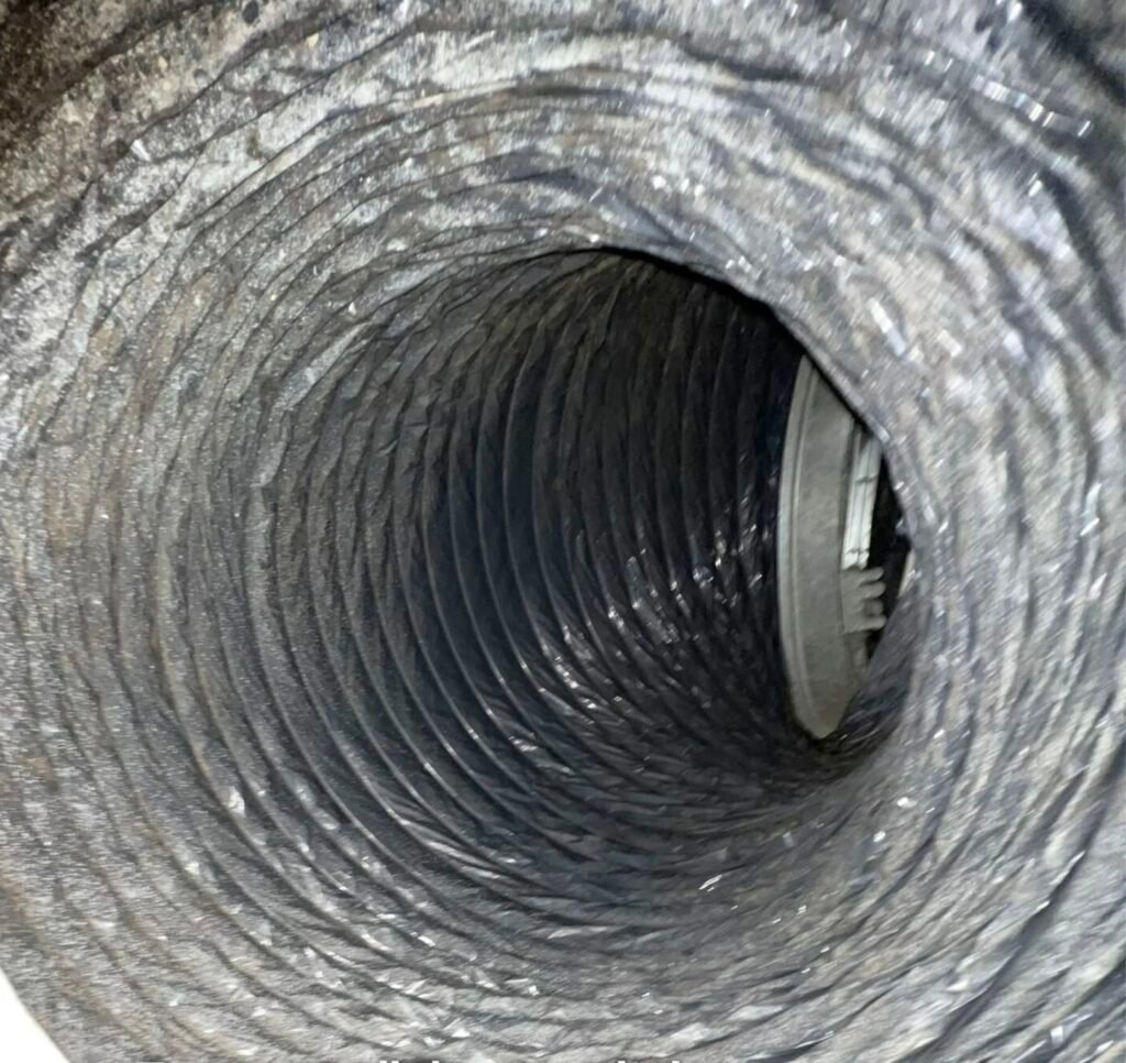 Interior surfaces of an air duct after cleaning